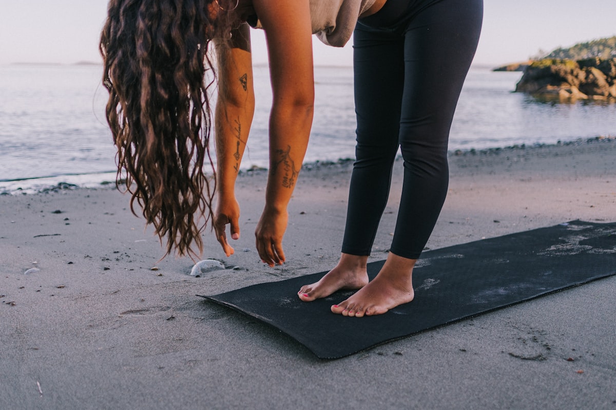Yoga teacher guiding students in a peaceful class